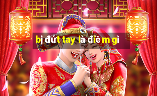 bị đứt tay là điềm gì